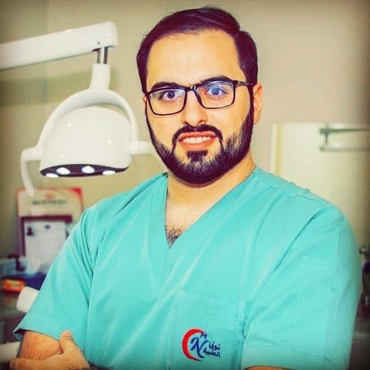 دكتور احمد فلاحة الأسنان